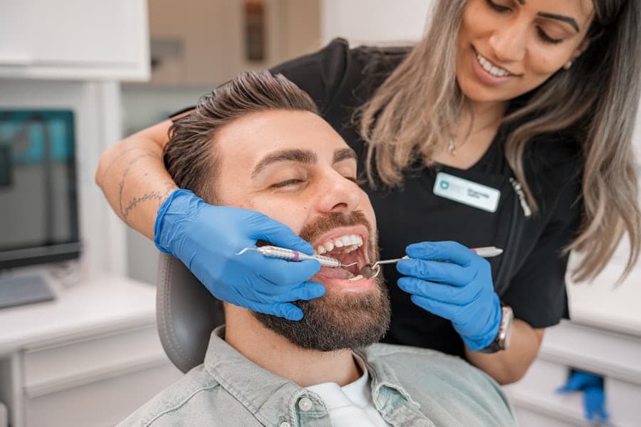 Professional teeth whitening treatment in progress