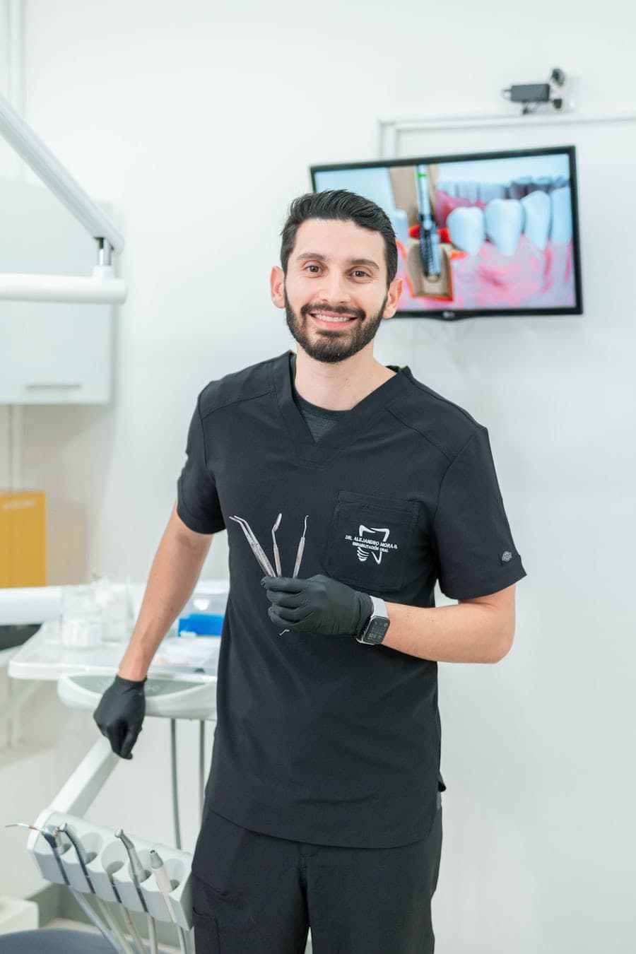 Portrait of a man with a beard smiling warmly